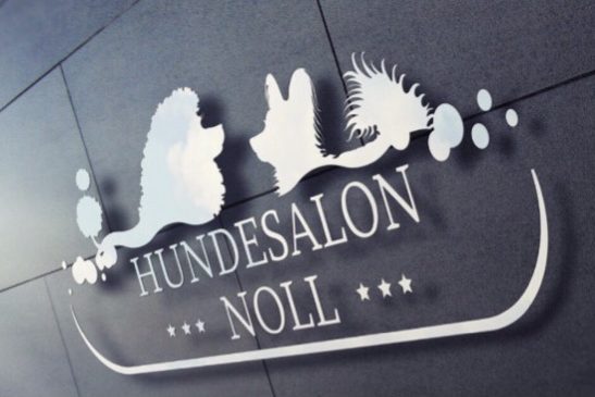Logo des Hundesalons Noll mit stilisierten Tierumrissen.